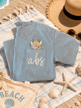 Load image into Gallery viewer, 🌊 Coastal Shell Pocket Monogram Tee
